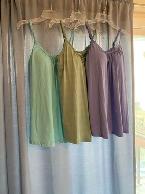 Set of Three 32Degrees Spaghetti Strap Tank Tops in Aqua, Olive, and Lavender.